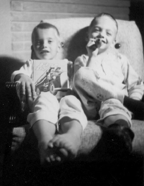 Billy Windsor and Tony Windsor sharing a chair in 1954.