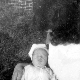 Billy Windsor held by mother Mary January 1949