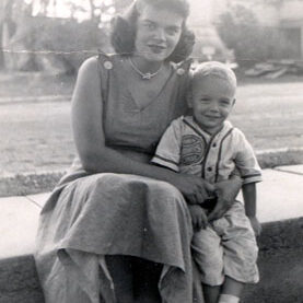 Mother Mary Windsor with Billy Windsor in baseball suit in 1950